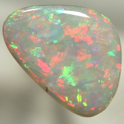 SOLID SEMI BLACK OPAL Sparkling bright red and green jumping over each other